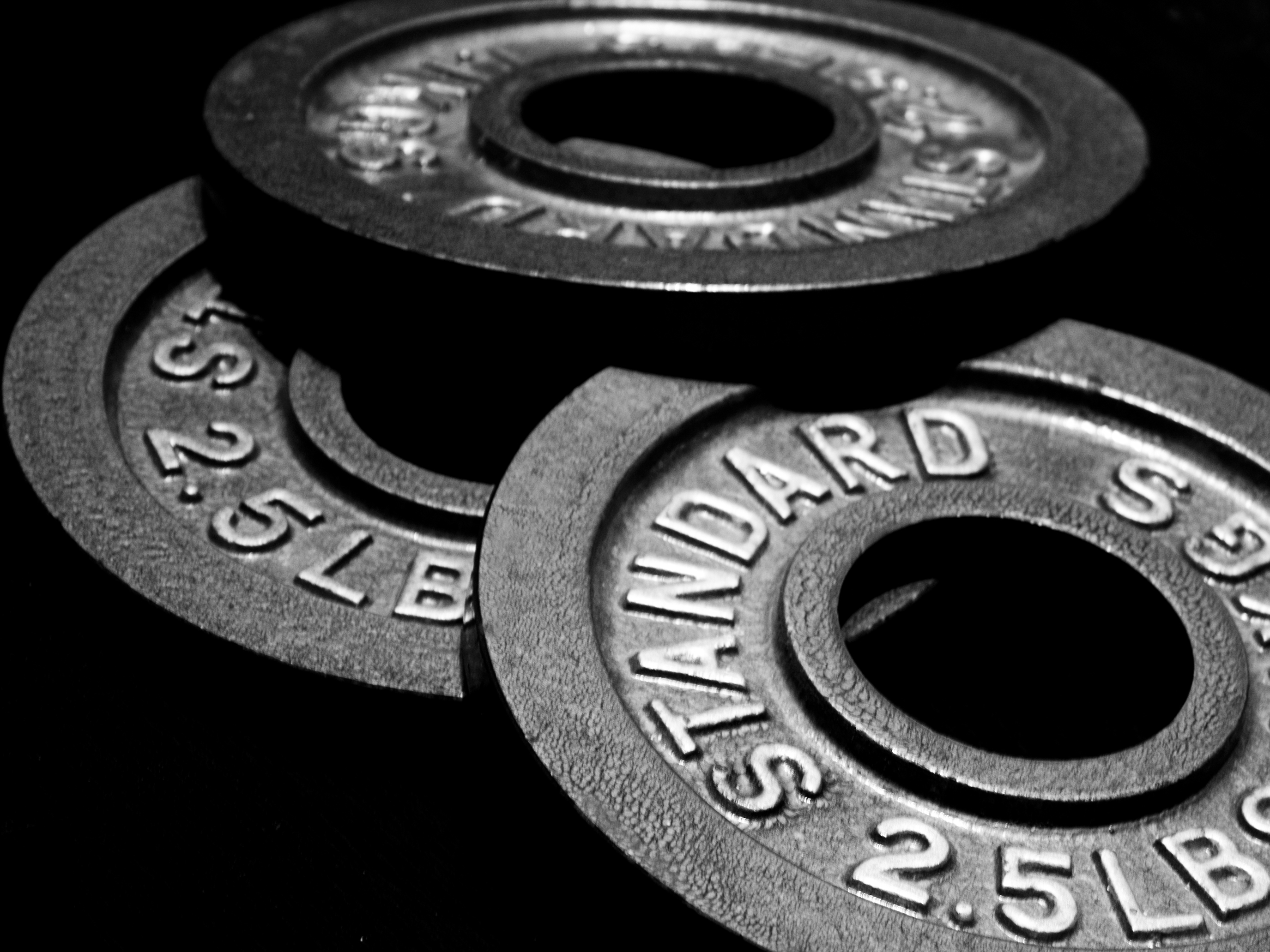 Lifting Vault Logo of Unlocked Padlock with Dumbell on it